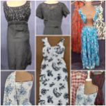 A quantity of 1950's-1970's ladies clothing, mainly Summer dresses UK size 12, to include a