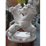 A miscellaneous lot to include a selection of ceramic figurines and animals models and others to