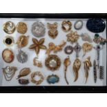 Vintage brooches and clips to include gold tone, silver tone and paste examples. Location:BWR