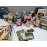 Collectables to include Natwest Wade pig money boxes, chandeliers, film related prints and book,