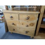 A Victorian pine chest of two short and two long drawers on turned legs, 81cm h x 86cm w Location: