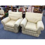 A pair of Duresta Waldorf armchairs upholstered in a yellow striped fabric, on castors Location: