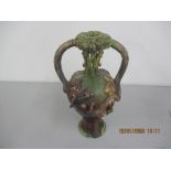 A late 19th/early 20th century Palissy ware vase, the handles in the form of snakes and decorated