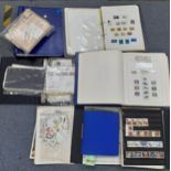 Stamps - three part stamp albums, a cover album and a stock book Location: