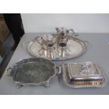 Mixed silver plate to include a twin handled tray, tureen, food warmer and a four piece tea set