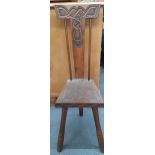 A small Welsh spinning stool carved by Ben Setter, Totness with Celtic knot design Location: A2B