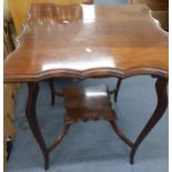 An early 20th century two tier mahogany occasional table Location: A3M