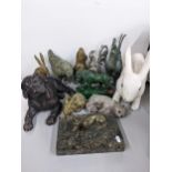 A selection of model animals to include a bronze dog mounted on a marble base, silver plated model