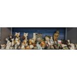 A quantity of model animals, Lladro cat and others, Tiffany style garden ornaments of an Owl and