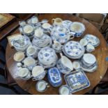 A quantity of mixed blue and white household ceramics to include a Johnson Bros part dinner service,