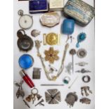 Early to mid 20th Century costume jewellery to include a small white metal chain purse, an RAF