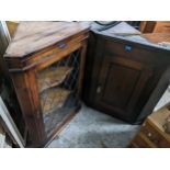 Two corner wall hanging cabinets to include an oak Georgian example Location: