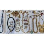 Mixed costume jewellery, mainly 1980's earrings and necklaces to include Joan Rivers and Monet and a