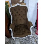 An early 20th century French white painted wooden framed chair with brown upholstery Location: G