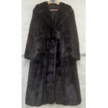 A vintage Zobelot Bielefeld dark brown mink coat with embroidered lining. Location:Rail