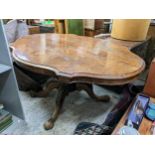 A Victorian walnut tilt top loo table on carved cabriole legs, 69cm h x 145cm w Location: