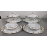 Two pairs of 19th century hand painted tureens, to include one pair decorated with roses and