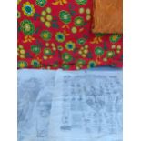 A quantity of vintage fabrics to include a 1970's red quilted eiderdown 77" x 63" and two 19th