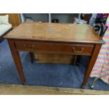 A late 19th/early 20th century mahogany writing desk having a leather topped scriber and single