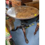 A Georgian mahogany tilt top occasional table having a dish top and on three cabriole legs 70cm h