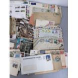 A selection of postcards, franked envelopes, first day covers and loose stamps Location: