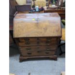 A George III mahogany bureau with four graduated long draw. Location: