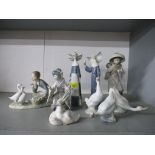 A group of Lladro and Neo porcelain figurines and animal sculptures to include two Lladro