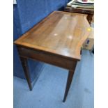 A George III mahogany serpentine fronted side table having parquetry inlaid, single drawer and