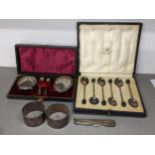 Mixed silver to include a pair of napkin rings hallmarked Birmingham 1948, together with six cased