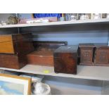 A group of Victorian and later boxes to include a writing box with fitted interior, and two carved