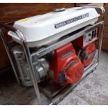 A Honda E1500 generator in red Location: