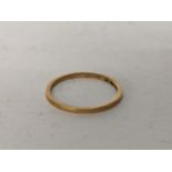 a 22nd gold wedding band, 1.4g Location: