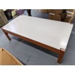 A mid 20th century Parker Knoll rectangular topped coffee table 32cm h x 110cm w, together with a