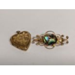 A 9ct gold heart shaped pendant, 4.8g, together with a gold plated brooch Location: