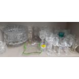 A quantity of mixed domestic glass to include glass candlesticks and airtwist pedestal glasses,