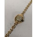 A 9ct gold ladies Rotary manual-wind wristwatch on a 9ct gold bracelet, 11.6g Location: