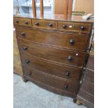 A Victorian mahogany bow fronted chest of drawers, three short drawers over four graduated drawers