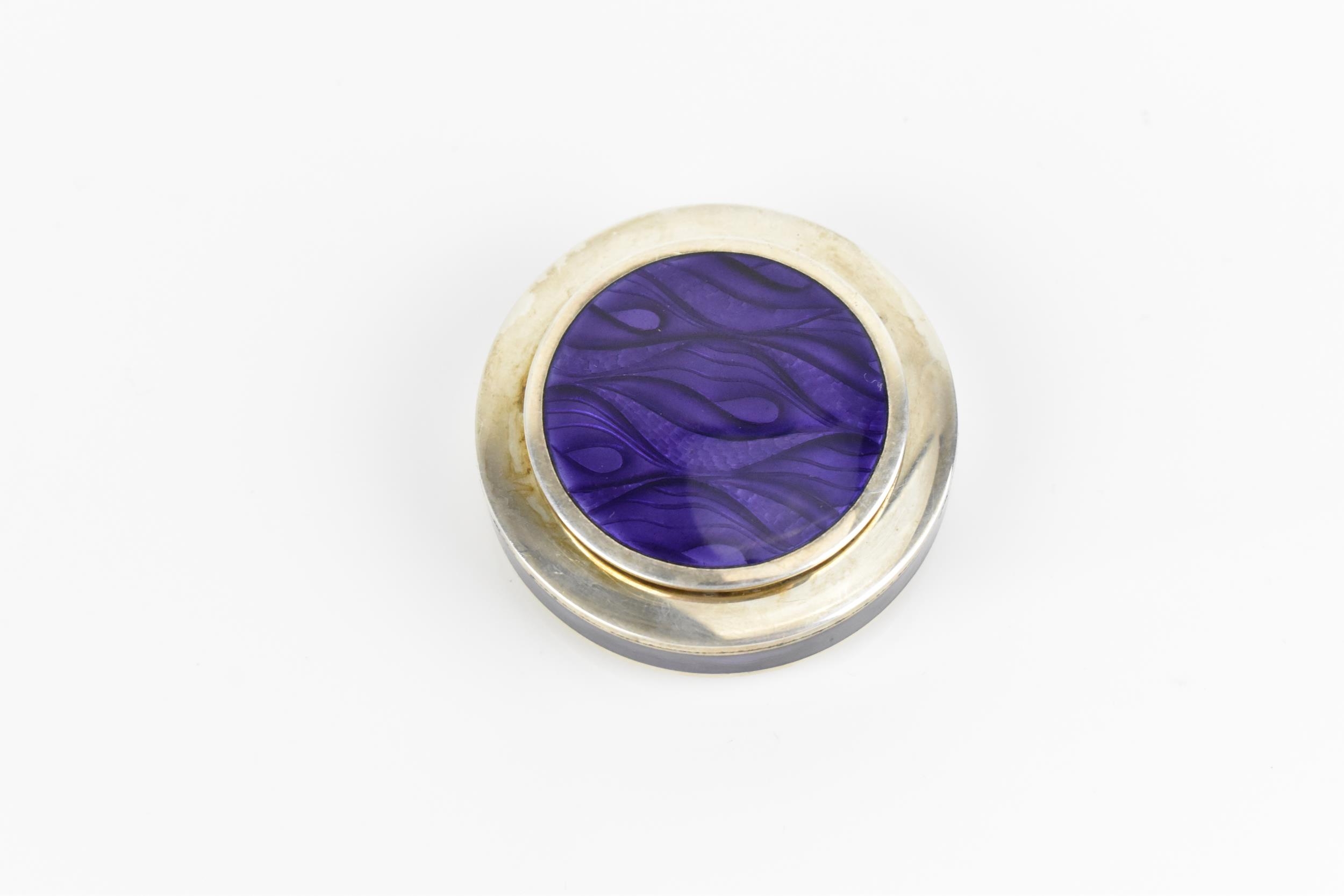 A modern British silver and enamel pill box, of circular form with purple wave pattern to the - Image 2 of 8