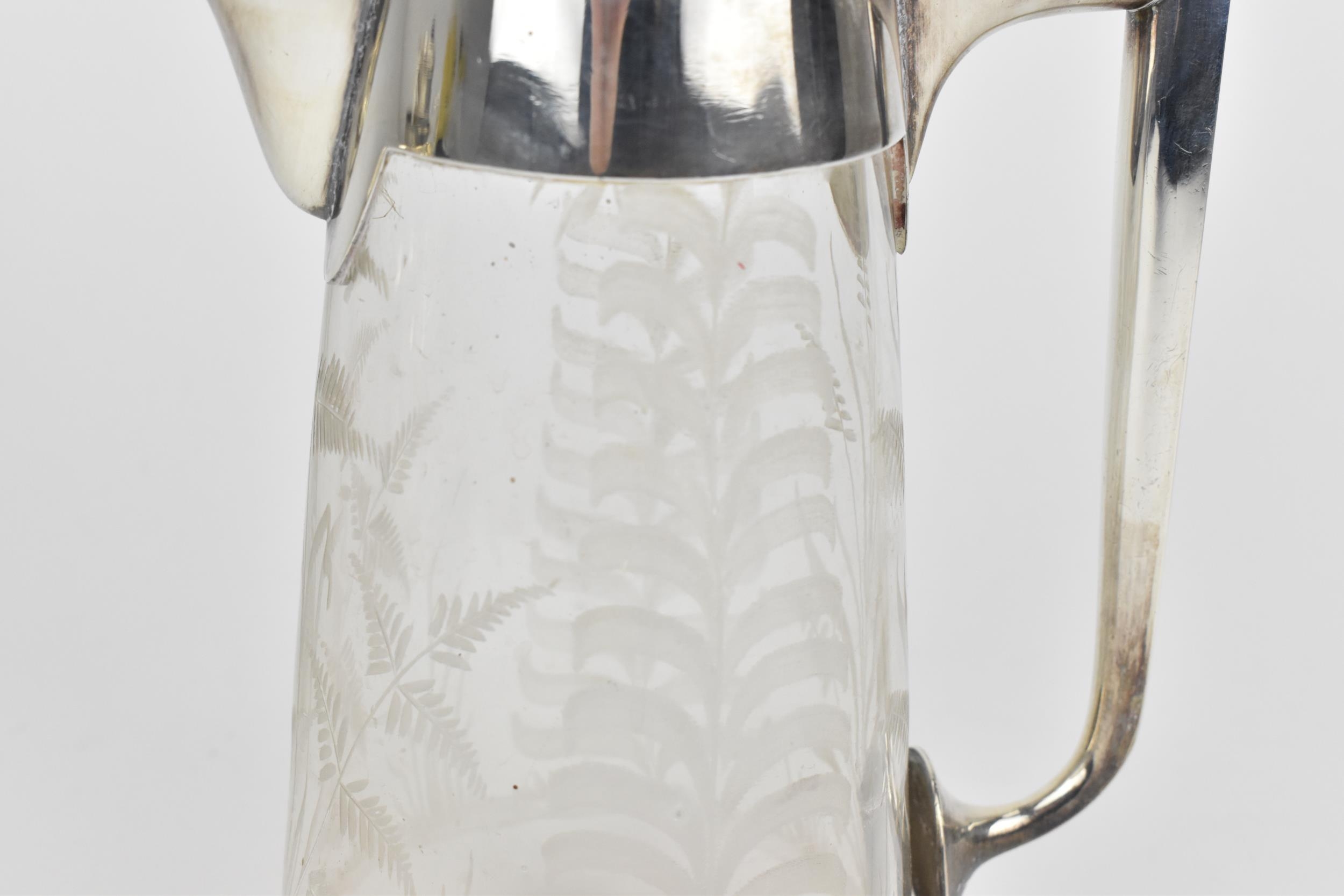 A Victorian silver mounted glass jug by John Grinsell & Sons, London 1893, of tapered form with - Image 3 of 4