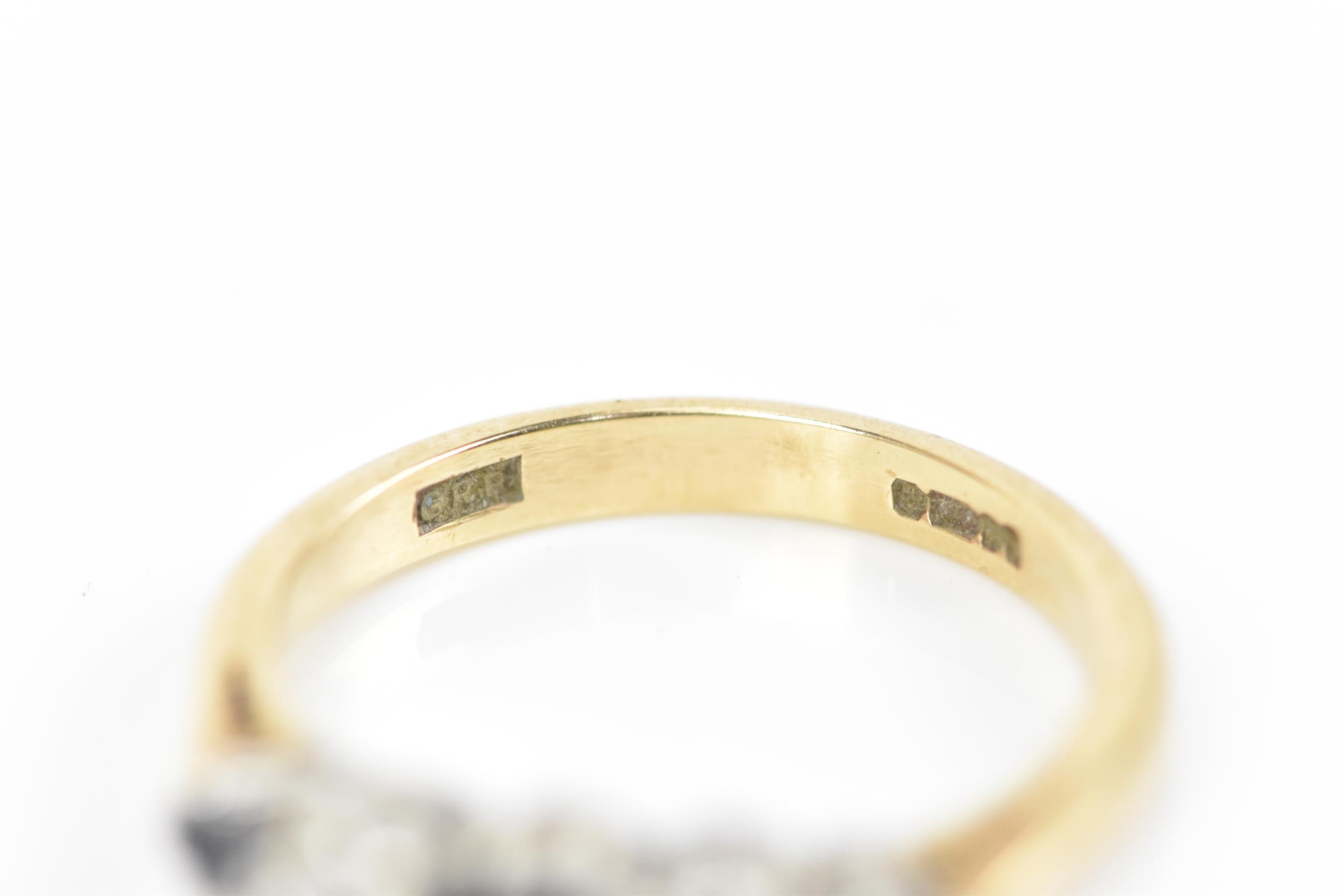 A 9ct yellow gold, diamond and blue sapphire five stone ring, designed with alternated and graduated - Image 3 of 5