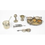 A small collection of silver miniature doll house items, comprising a tea service by Levi & Salaman,
