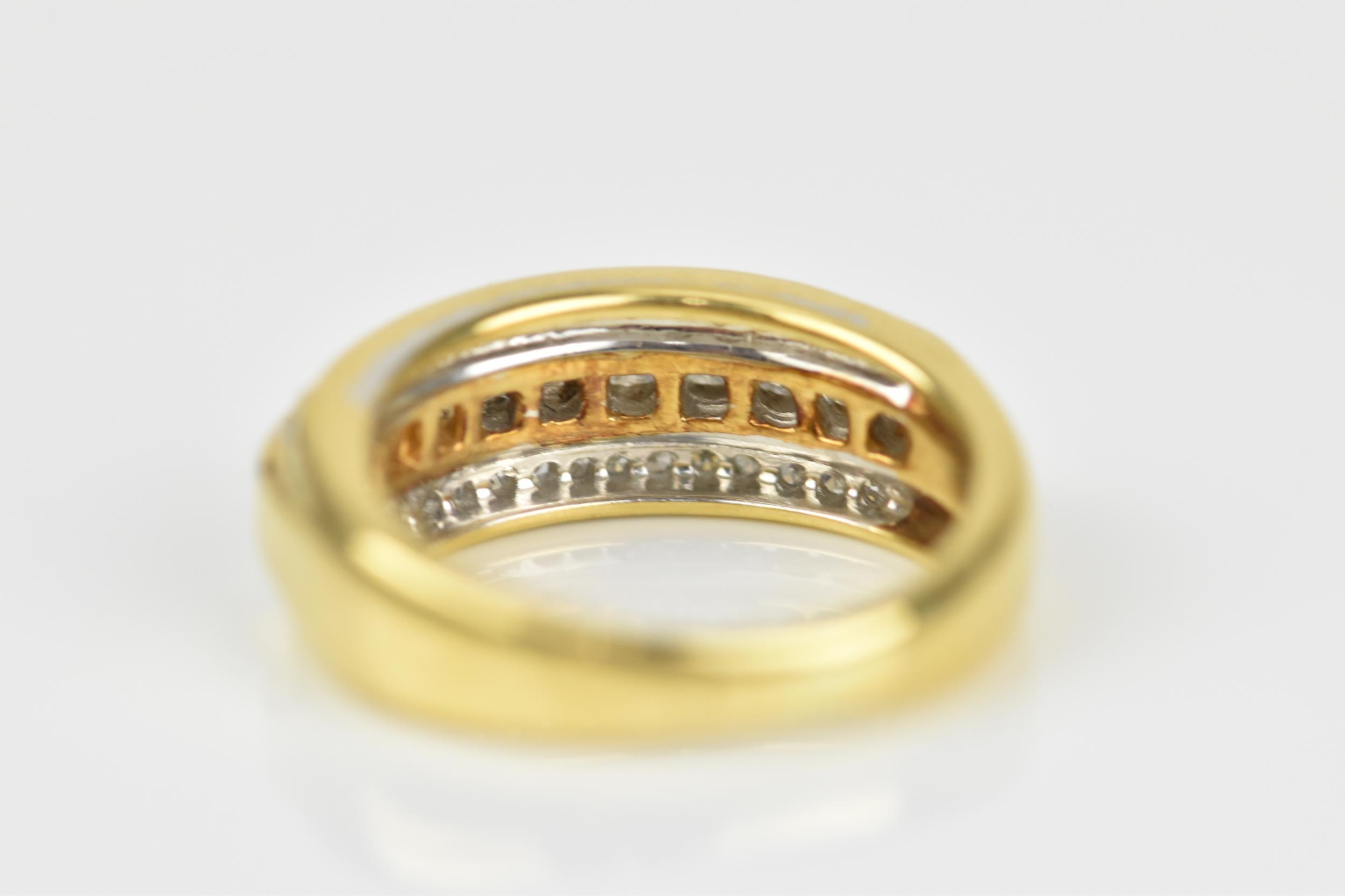 An 18ct yellow gold and diamond three row ring, set with a central row of brilliant cut channel - Image 3 of 5