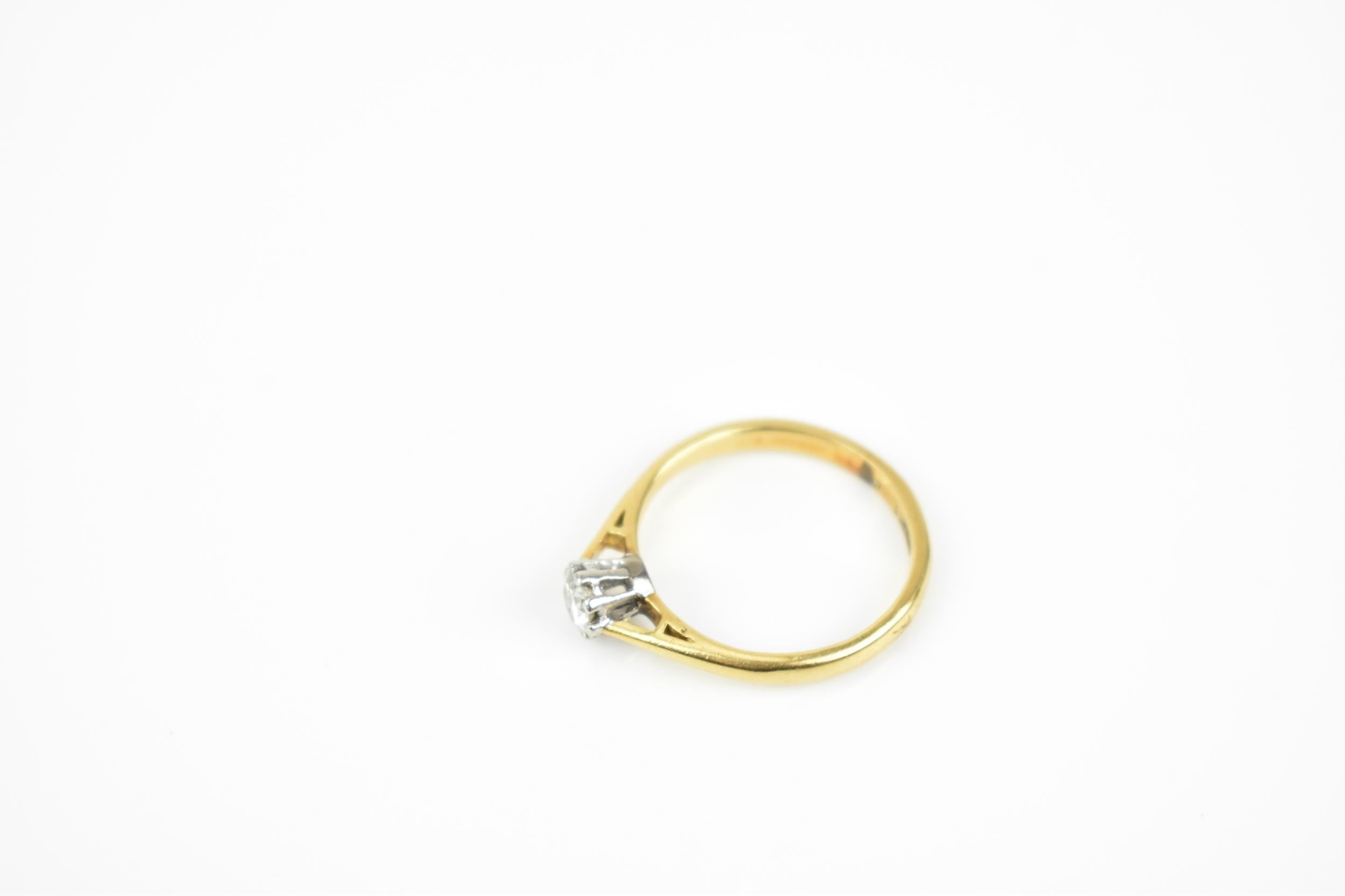 An 18ct yellow gold, platinum and diamond solitaire ring, the brilliant cut stone set in an eight - Image 4 of 6