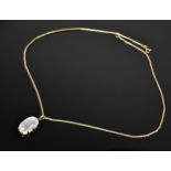 A 9ct yellow gold box chain and moonstone and diamond necklace, probably Edwardian, the cabochon