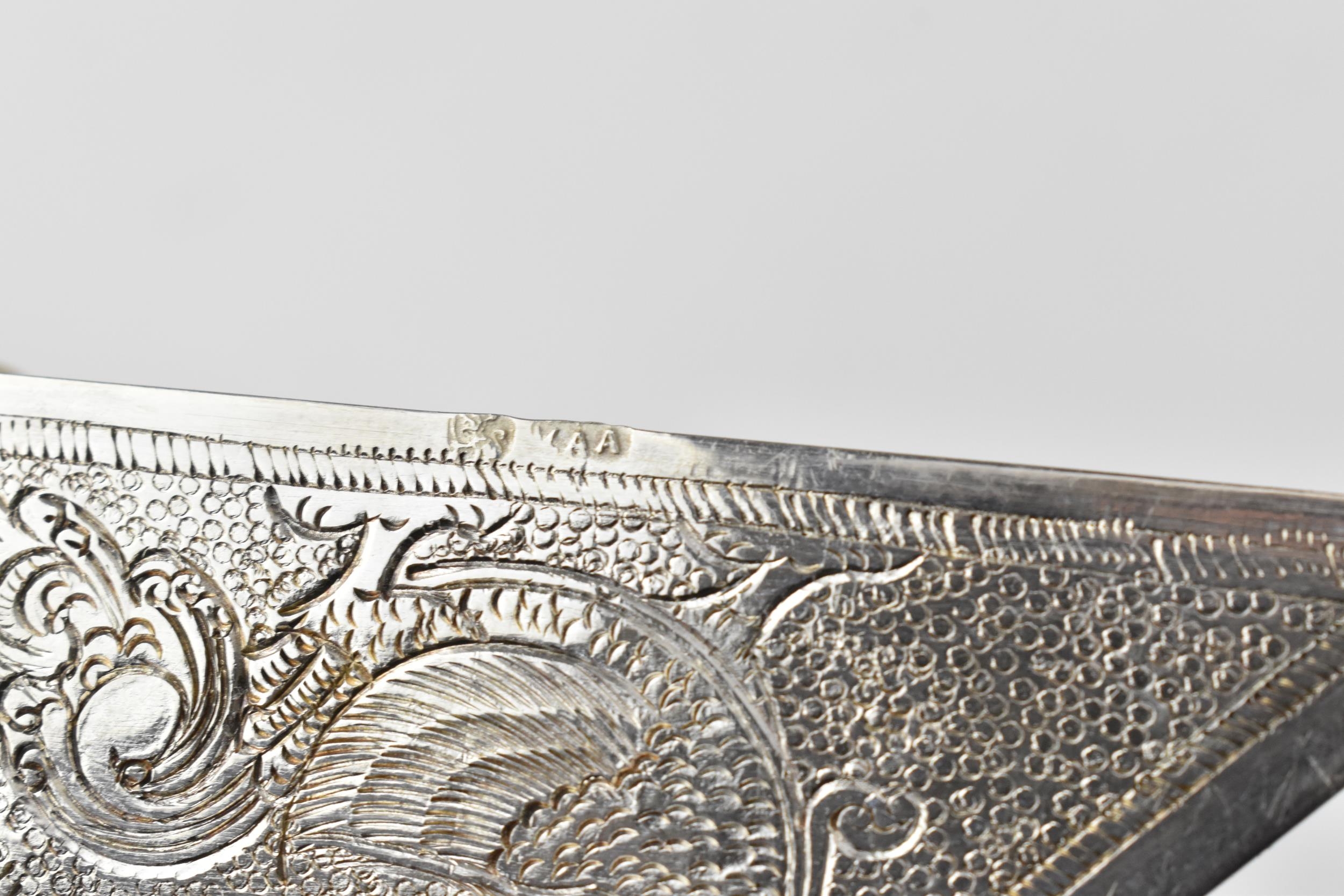 A set of four Sri Lankan (Ceylon) silver corner protectors, probably for important documents or - Image 5 of 5