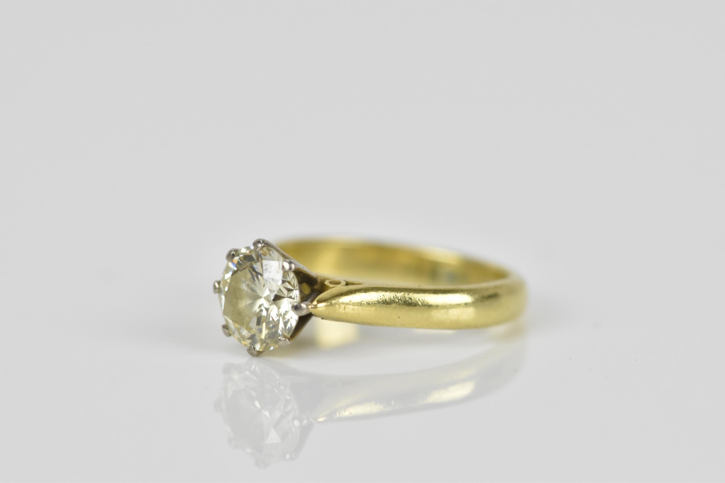 An 18ct yellow gold, white metal and solitaire diamond ring, the brilliant cut stone in an eight - Image 2 of 8