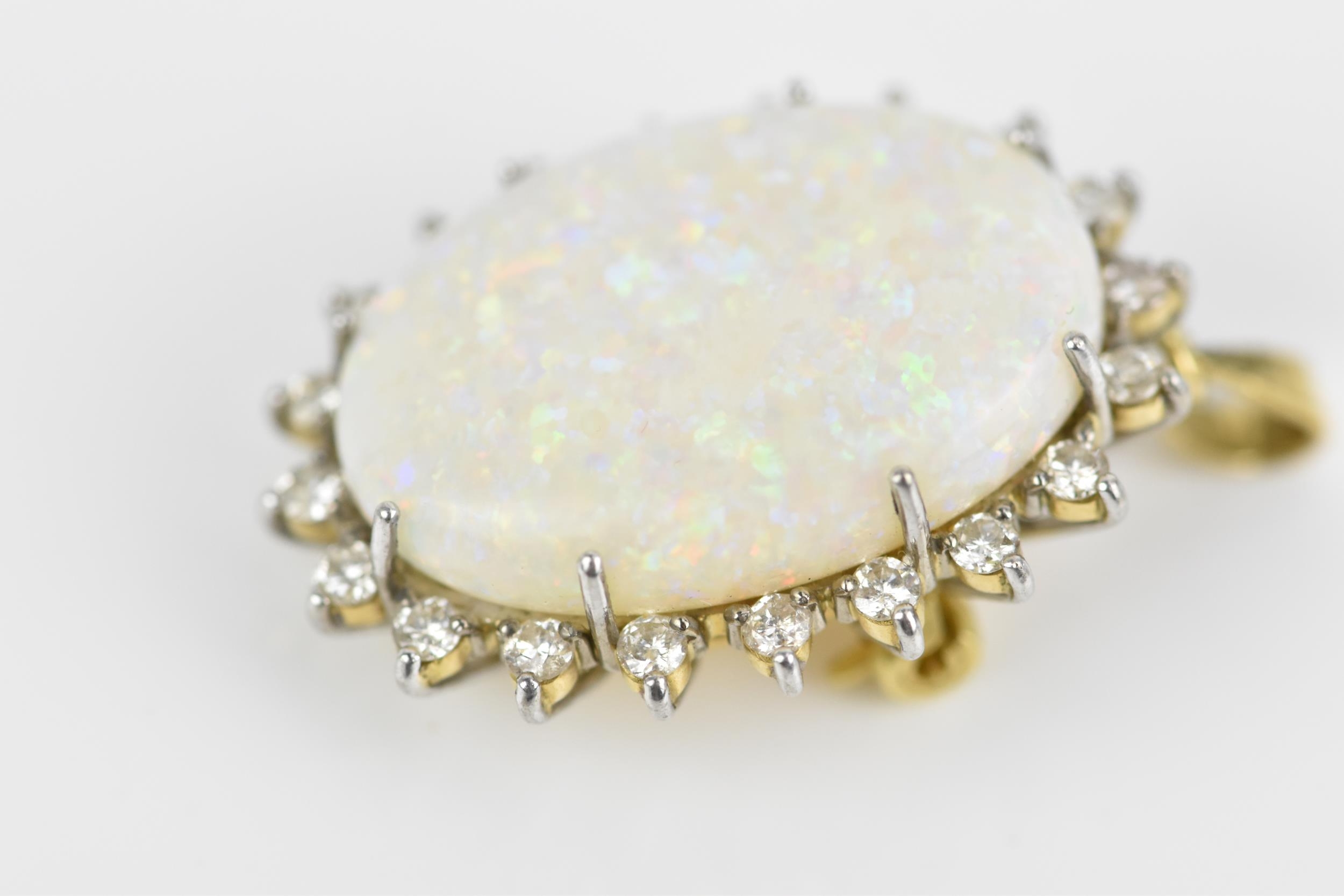 An 18ct yellow gold, white metal, diamond and white opal pendant/brooch, of oval design with central - Image 2 of 6