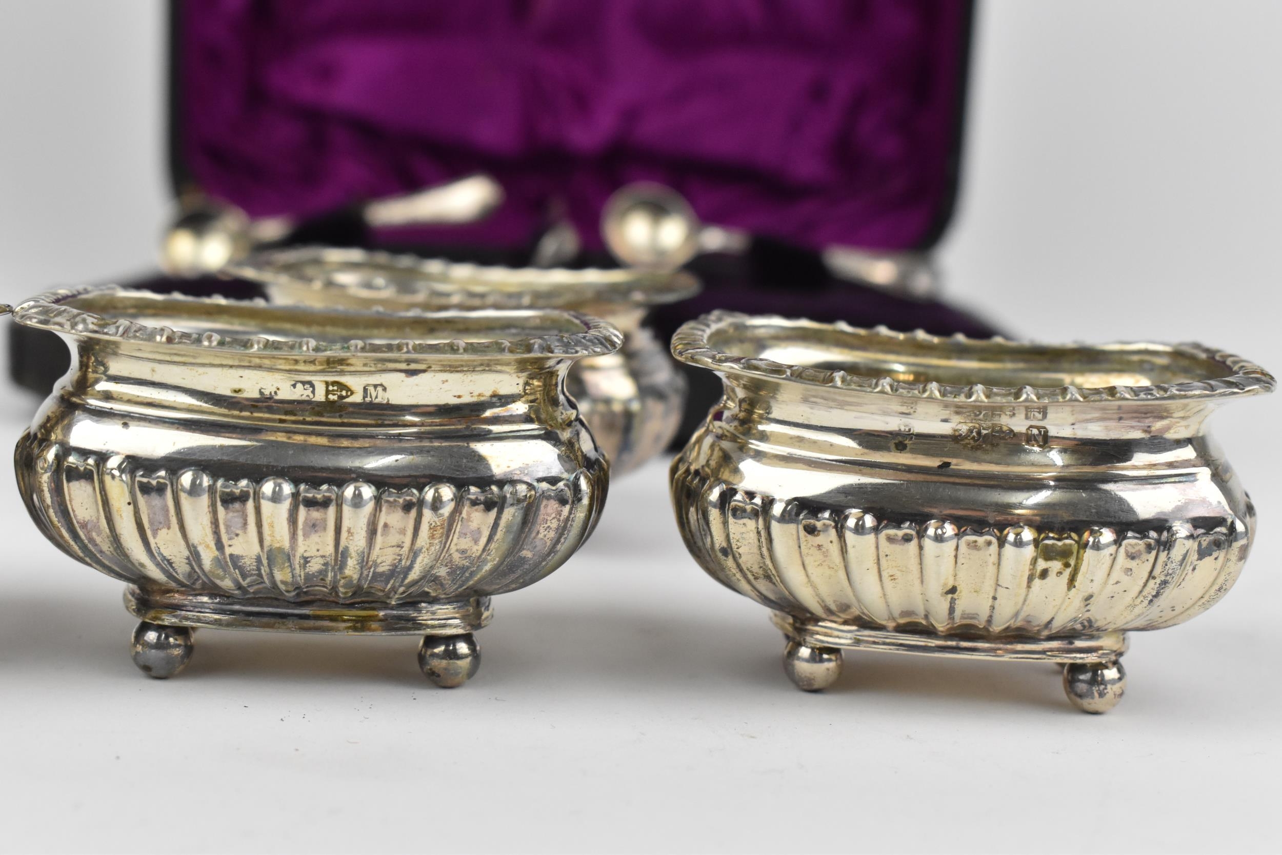 A cased set of Victorian silver salts by James Deakin & Sons, Chester 1896, of rectangular form with - Image 4 of 6