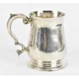A George II silver tankard mug by Richard Gurney & Thomas Cook, London 1738, with c-scroll handle,