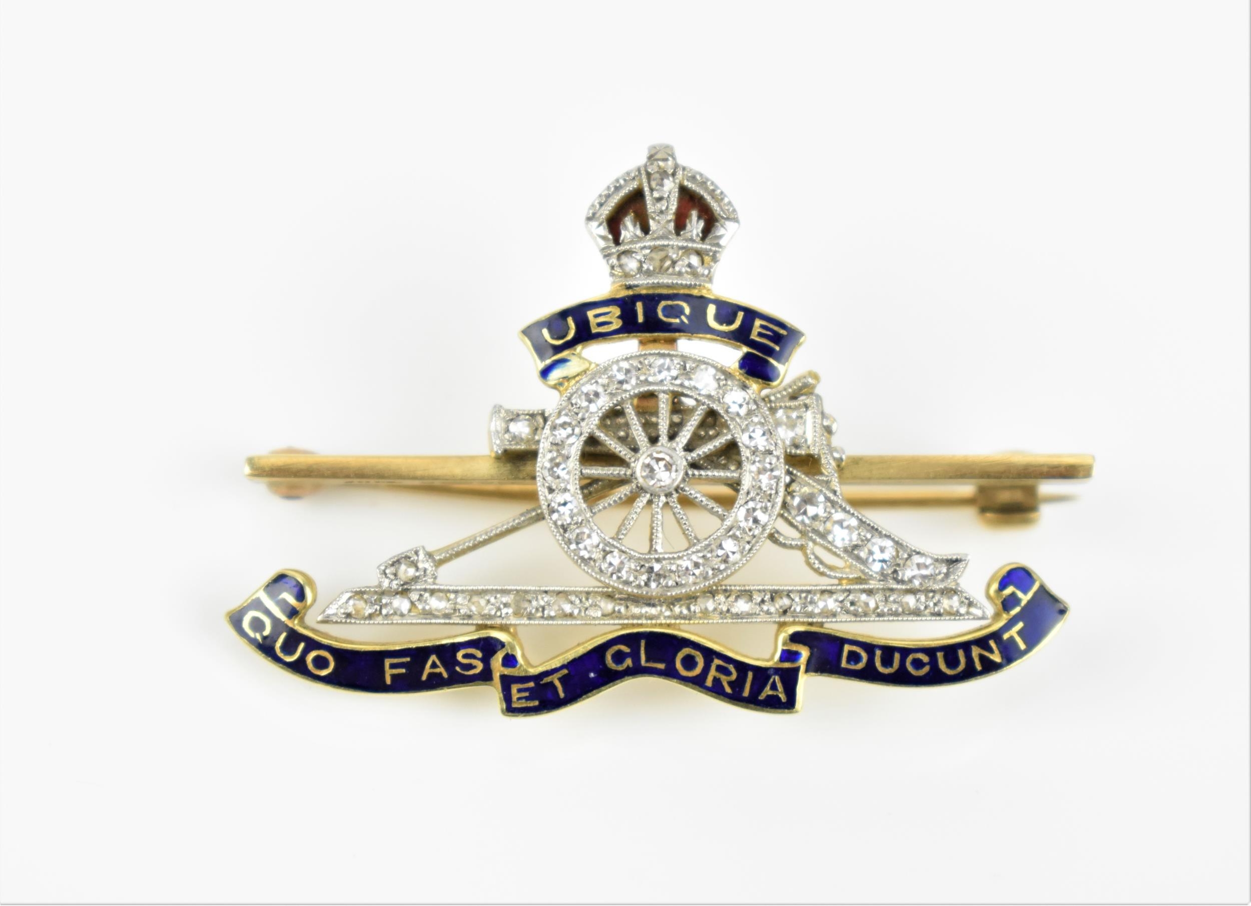 A 14ct yellow gold, platinum and diamond Royal Regiment of Artillery sweetheart cap badge, with